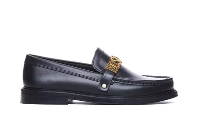 Moschino Logo Plaque Loafers In Black