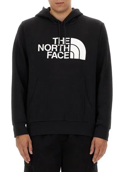 The North Face Logo Printed Drawstring Hoodie In Black